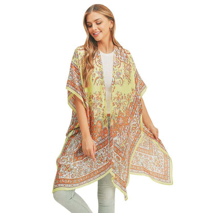 Green Patterned Cover Up Kimono Poncho, Absolutely fab for this summer & spring season to amp up your attire & make you comfortable in dressing up. These kimonos feature a beautiful pattern that is easy to pair with so many tops. 