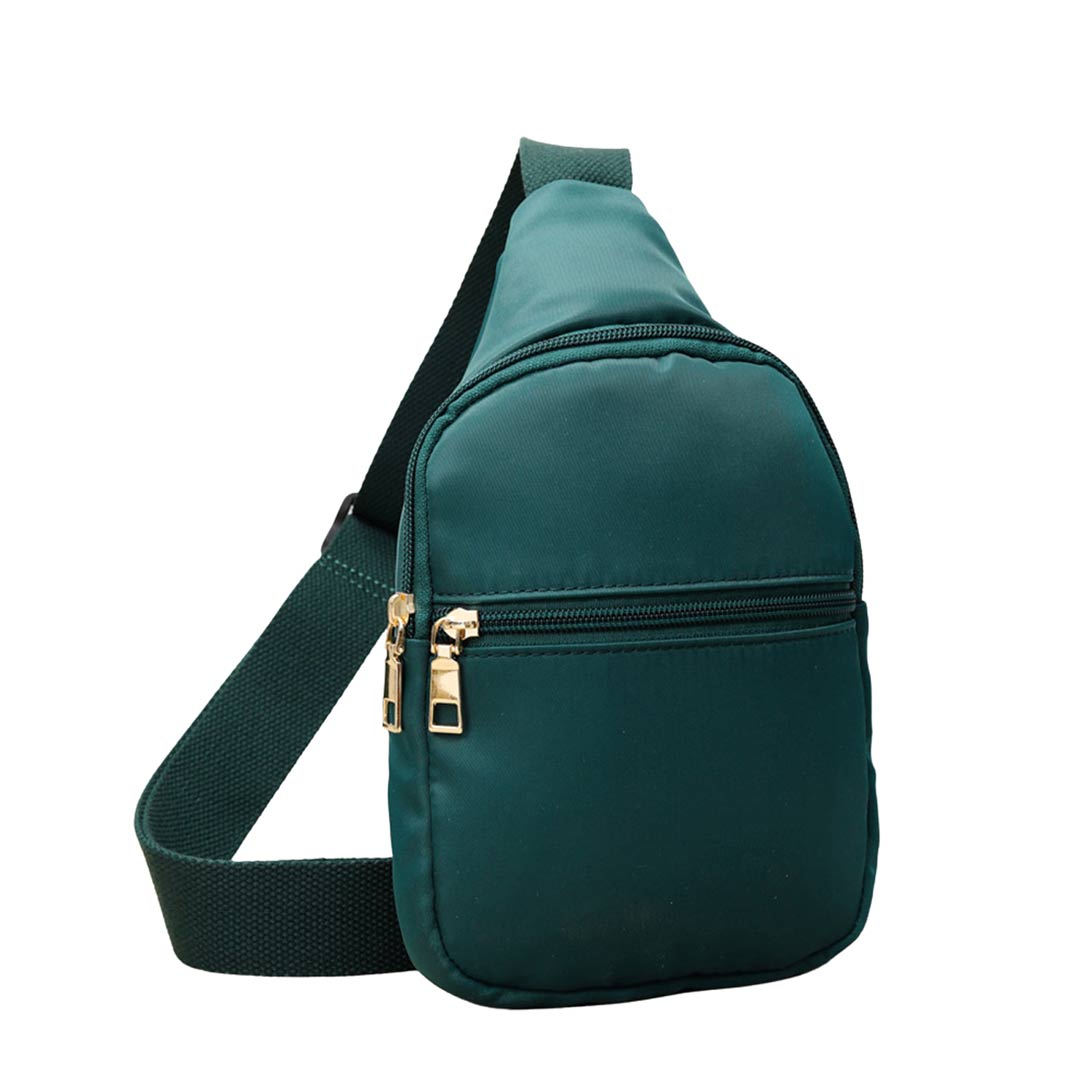Green Solid Nylon Mini Sling Bag, be the ultimate fashionista while carrying this Solid Nylon Mini Sling bag in style. It's great for carrying small and handy things. Keep your keys handy & ready for opening doors as soon as you arrive. The adjustable lightweight features room to carry what you need for those longer walks or trips.