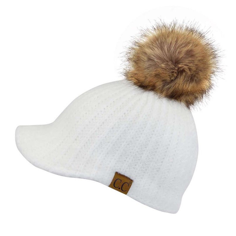 Ivory C.C Cable Knitted Brim Beanie Natural Faux Fur Pom Pom Warm Winter Hat; reach for this classic toasty hat to keep you nice and warm in the chilly winter weather, the wintry touch finish to your outfit. Perfect Gift Birthday, Christmas, Holiday, Anniversary, Stocking Stuffer, Secret Santa, Valentines Day, Loved One, BFF