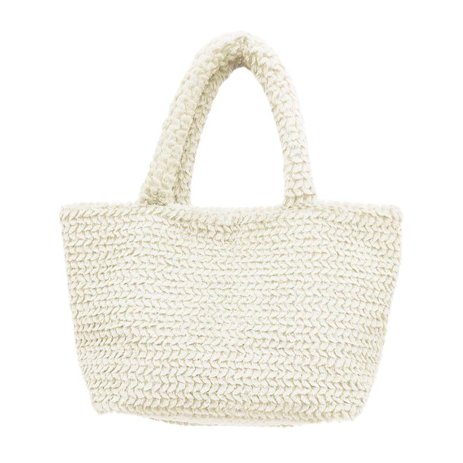 Ivory Fuzzy Fur Tote Bag, is a cute and beautiful mini tote bag that enriches your accessory collection and amps up your outlook with beautiful color variations. It perfectly goes with any outfit in any style. Easy to carry and keep your handy items safe and secure. Nice color variation gives you the opportunity to match the tote up with any ensemble, any time, and anywhere. An excellent gift for your near and dear ones. Have a cute look with this fuzzy fur tote!