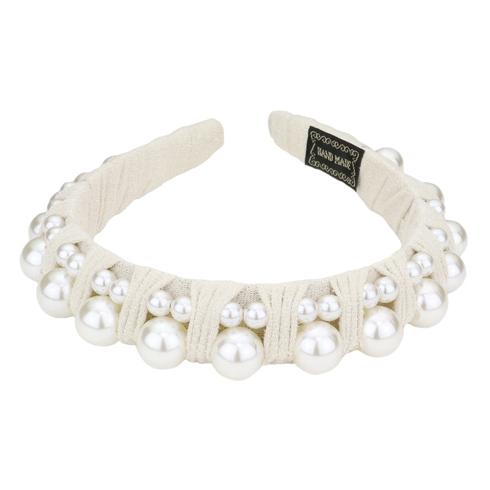 Ivory Pearl Embellished Headband, this beautiful pearl headband is awesome that makes you feel extra glamorous. Push back your hair with this pretty Pearl headband to show your trendy choice off or avoid a bad hair day. Add a pop of color to any outfit & be ready to receive compliments.