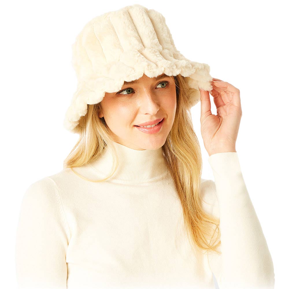 Ivory Soft Faux Fur Bucket Hat, show your trendy side with this Faux Fur Bucket Hat. Adds a great accent to your wardrobe. This elegant, timeless & classic Bucket Hat looks fashionable. Perfect for a bad hair day, or simply casual everyday wear.  Accessorize the fun way with this Solid bucket hat. It's the autumnal touch you need to finish your outfit in style. Awesome winter gift accessory for that fashionable on-trend friend.