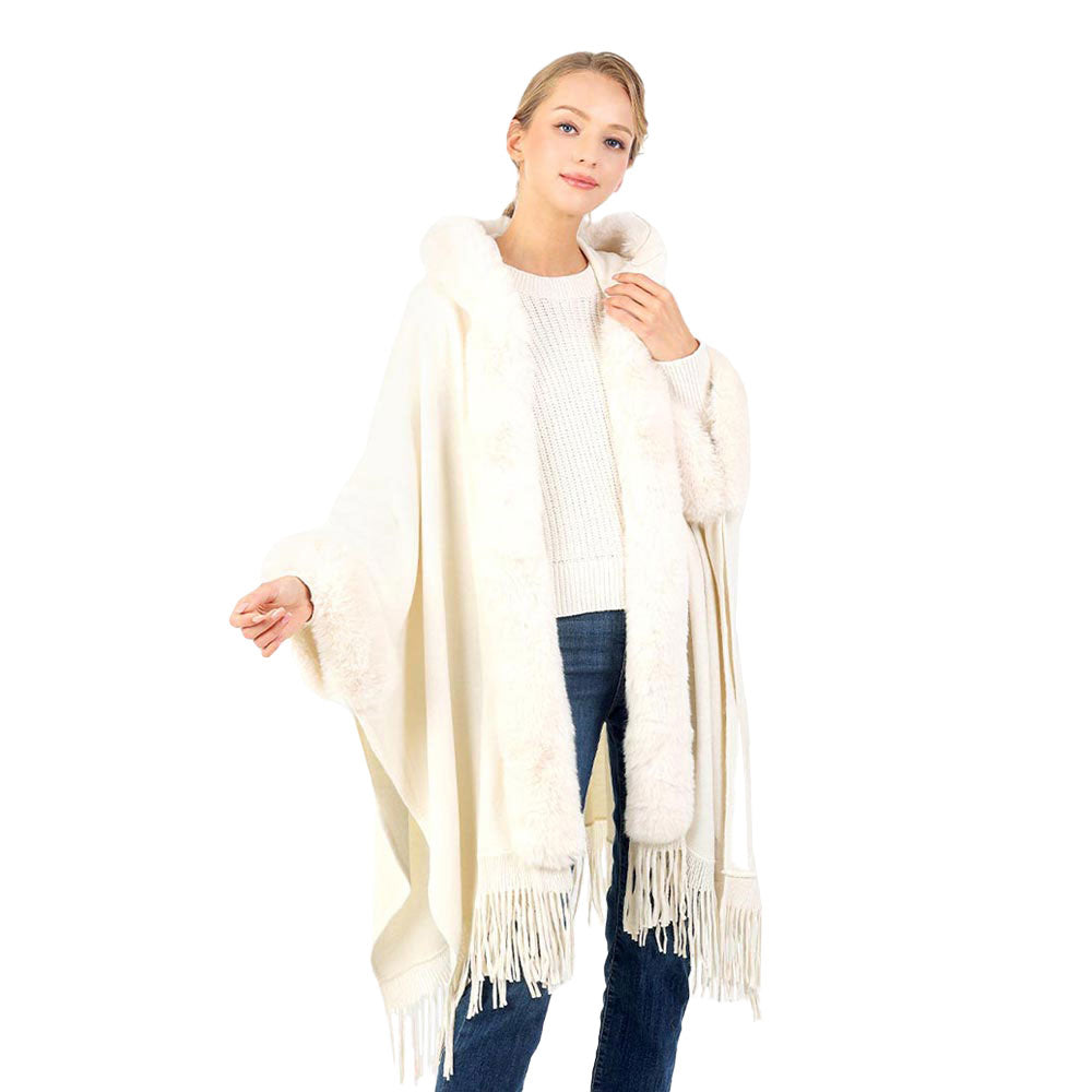 Ivory Solid Color Hoodie Winter Cape With Faux Fur Edge, is beautifully designed with solid color that amps up your beauty to a greater extent. It enriches your attire with perfect combination. Breathable Fabric, comfortable to wear, and very easy to put on and off. Suitable for Weekend, Work, Holiday, Beach, Party, Club, Night, Evening, Date, Casual and Other Occasions in Spring, Summer and Autumn.
