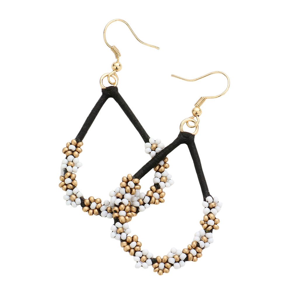 Jet Black Floral Seed Beaded Open Teardrop Dangle Earrings, Fashionable beaded dangle earrings for women are designed into a teardrop shape. They are the perfect addition to your earrings collection. These adorable floral details teardrop dangle earrings are bound to cause a smile. You will absolutely love these beaded earrings! They are exactly what you were looking for; This jewelry is just the right accessory to finish off any outfit.