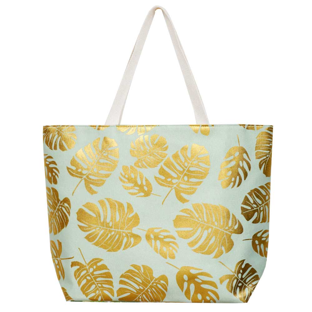 Mint Tropical Leaves Foil Beach Bag, Show your trendy side with this awesome Flower & Leaf beach tote bag. Spacious enough for carrying any and all of your seaside essentials. The soft rope straps really helps carrying this shoulder bag comfortably. Folds flat for easy packing. Perfect as a beach bag to carry foods, drinks, big beach blanket, towels, swimsuit, toys, flip flops, sun screen and more.