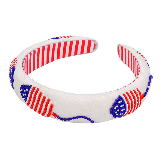 Multi American USA Flag Beaded Headband. This beautiful color Headband easy to use, light weight, Push back your hair with this exquisite knotted headband, spice up any plain outfit! Be ready to receive compliments. Be the ultimate trendsetter wearing this chic headband with all your stylish outfits! Show your love for our country with this sweet patriotic USA flag style American Flag headband. Featuring red, white and blue stars and beads for a bit of fashionable fireworks flair.