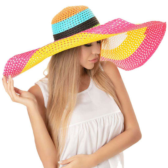 Multi Color Block Cut Out Straw Sun Hat, whether you’re basking under the summer sun at the beach, lounging by the pool, or kicking back with friends at the lake, a great hat can keep you cool and comfortable even when the sun is high in the sky.  Large, comfortable, and perfect for keeping the sun off of your face, neck, and shoulders, ideal for travelers who are on vacation or just spending some time in the great outdoors.