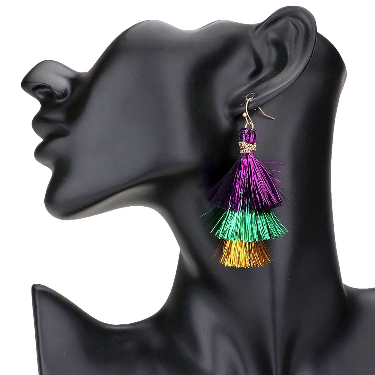 Multi Mardi Gras Fringe Dangle Earrings, are beautifully crafted earrings that dangle on your earlobes with a perfect glow to make you stand out and show your unique and beautiful look everywhere. Put on a pop of color to complete your ensemble stylishly with these Mardi Gras-themed earrings. Highlight your appearance and grasp everyone's eye at any place. 