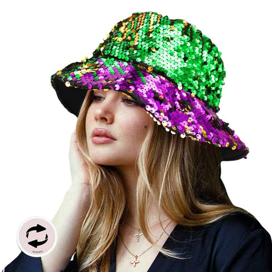 Multi Mardi Gras Reversible Sequin Bucket Hat, this sequin hat is an accessory that's sure to get you the attention you deserve this Mardi Gras season. Accented width purple, green, and gold sequin that can be hidden by simply reversing the hat! This is absolutely a fabulous hat for this mardi gras event.