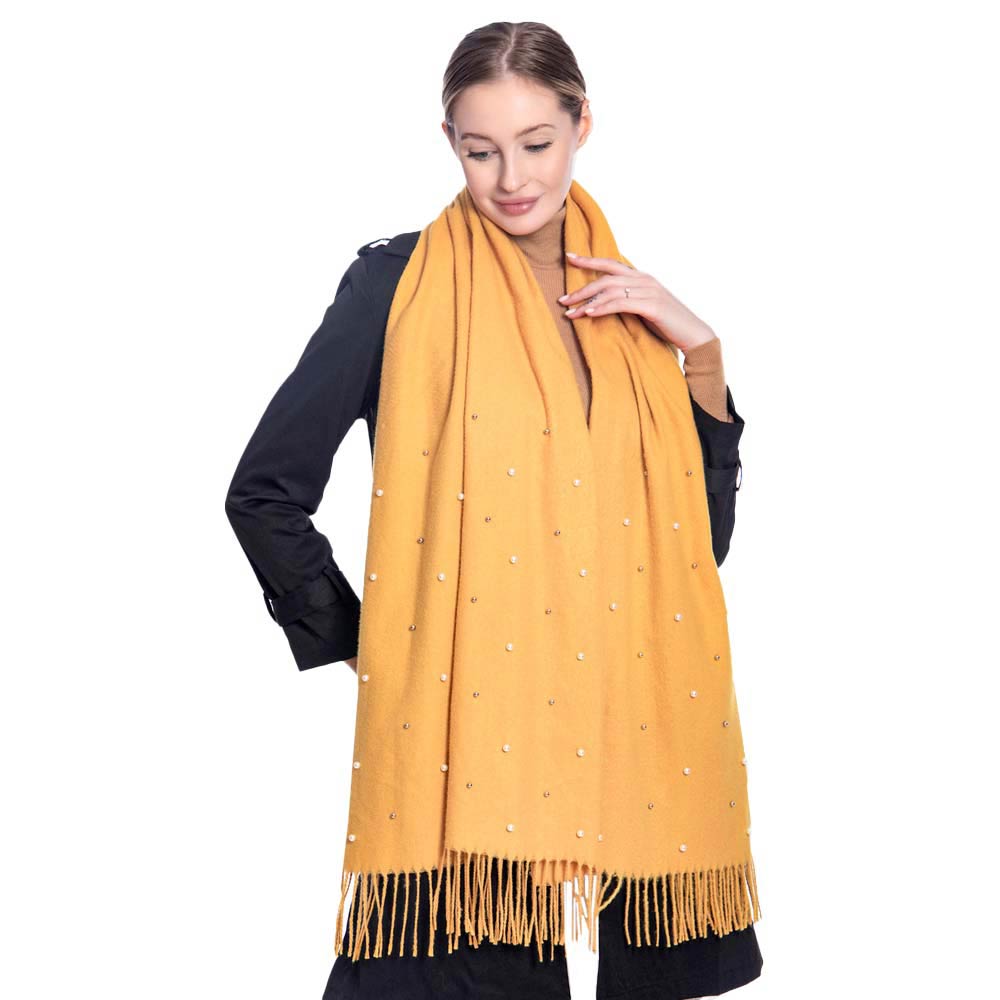 Mustard Pearl Embellished Solid Oblong Scarf, delicate, These Winter scarfs for women are elegant, and lightweight and can be added to any outfit to keep up with the latest color trends. Warm, on-trend & fabulous, a luxe addition to any cold-weather ensemble. Lovely pearl decoration makes you look chic and fashionable.