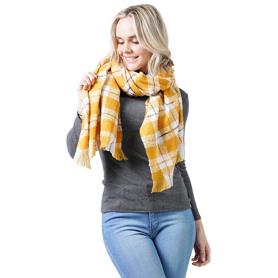 Mustard Plaid Check Oblong Scarf, accents your look with a soft, highly versatile plaid design and keeps you warm and toasty on cold days and in winter. A rugged staple brings a classic look. The variety of its color adds harmony & completes your outfit in style. You will feel cozy, comfortable, and confident everywhere with this oblong scarf. Throw it on over so many pieces elevating any casual outfit!