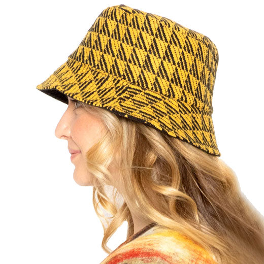 Mustard Polyester Geometric Patterned Bucket Hat, this bucket hat doubles as a rain hat and is snug on the head and stays on well. It will work well to keep the rain off the head and out of the eyes and also the back of the neck. Wear it to lend a modern liveliness above a raincoat on trans-seasonal days in the city.
