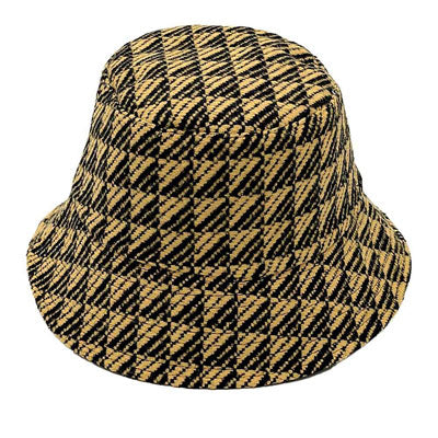 Mustard Polyester Geometric Patterned Bucket Hat, this bucket hat doubles as a rain hat and is snug on the head and stays on well. It will work well to keep the rain off the head and out of the eyes and also the back of the neck. Wear it to lend a modern liveliness above a raincoat on trans-seasonal days in the city. 