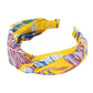 Mustard Tropical Leaf Patterned Twisted Headband, create a natural & beautiful look while perfectly matching your color with the easy-to-use leaf-twisted headband. Push your hair back and spice up any plain outfit with this tropical leaf patterned headband! Be the ultimate trendsetter & be prepared to receive compliments wearing this chic headband with all your stylish outfits! 