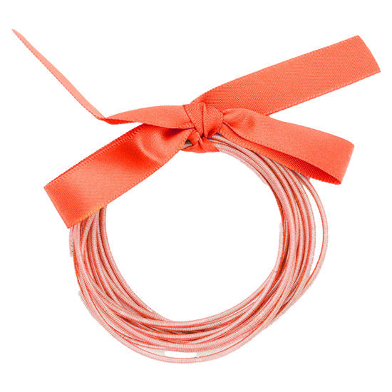 Peach Fashionable Guitar String Stackable Stretch Bracelets. These stackable bracelets can light up any outfit, and make you feel absolutely flawless. Fabulous fashion and sleek style adds a pop of pretty color to your attire, coordinate with any ensemble from business casual to everyday wear.
