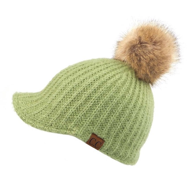 Pistachio C.C Cable Knitted Brim Beanie Natural Faux Fur Pom Pom Warm Winter Hat; reach for this classic toasty hat to keep you nice and warm in the chilly winter weather, the wintry touch finish to your outfit. Perfect Gift Birthday, Christmas, Holiday, Anniversary, Stocking Stuffer, Secret Santa, Valentines Day, Loved One, BFF