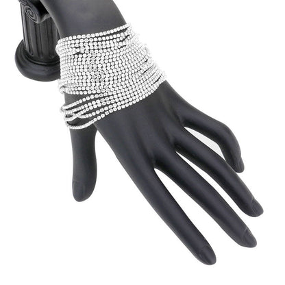 Rhodium Multi Layered Rhinestone Evening Bracelet. This Rhinestone Bracelet sparkles all around with it's surrounding stone, adds a sophisticated glow to any outfit. Stylish evening bracelet that is easy to put on, take off and comfortable to wear. Perfect jewelry to enhance your look. Perfect gift for your loved one. Awesome gift for birthday, Anniversary, Valentine’s Day or any special occasion.