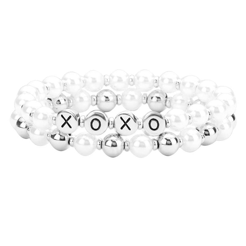 Rhodium XOXO Pearl Metal Ball Stretch Message Bracelets. Look like the ultimate fashionista with these bracelets! Add something special to your outfit this Valentine! special It will be your new favorite accessory. Perfect Birthday Gift, Anniversary Gift, Mother's Day Gift, Graduation Gift, Valentine's Day Gift.