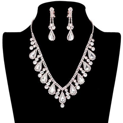 Rose Gold Crystal Rhinestone Teardrop Necklace Clip on Earring Set, beautifully crafted design adds a gorgeous glow to any outfit to show your ultimate class. Jewelry that fits your lifestyle with the perfect look! The perfect accessory for adding just the right amount of shimmer and a touch of class to special events. It's perfectly lightweight so that it can be worn throughout the whole week. 