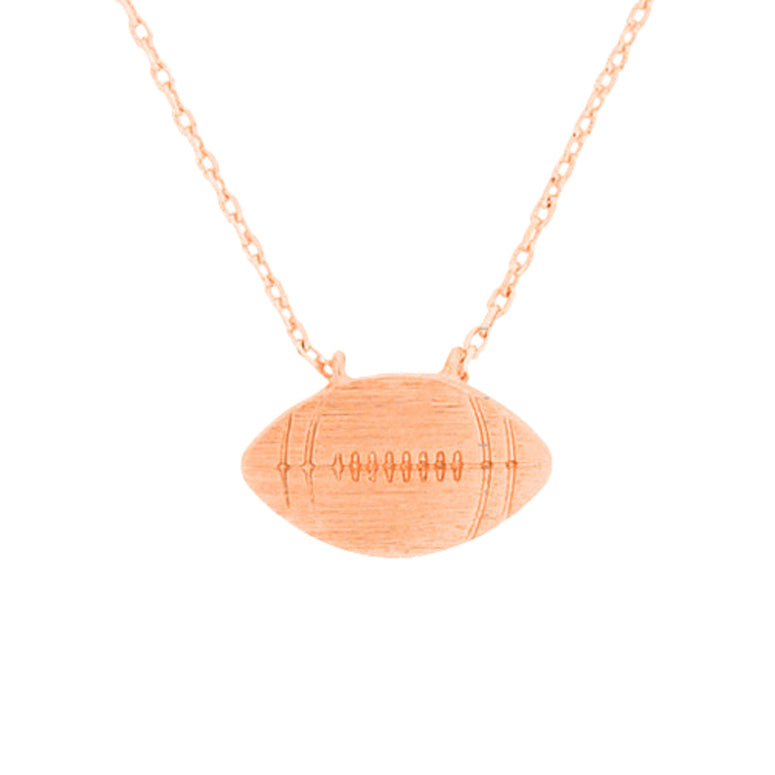 Rose Gold Metal Football Pendant Necklace, Add this simple sports-themed Pendant necklace to any look for a hint of bling! A delicately polished necklace that will enhance your look. It's versatile enough for wearing straight through the week. Coordinate with any ensemble from business casual to daily wear. The perfect addition to your attire and to every outfit. Wear this while cheering up your favorite team at the gallery to make you stand out from the crowd.