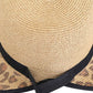 Tan C.C Leopard Wide Brim Straw Sun Hat, whether you’re basking under the summer sun at the beach, lounging by the pool, or kicking back with friends at the lake, a great hat can keep you cool and comfortable even when the sun is high in the sky.  Large, comfortable, and perfect for keeping the sun off of your face, neck, and shoulders, ideal for travelers who are on vacation or just spending some time in the great outdoors.