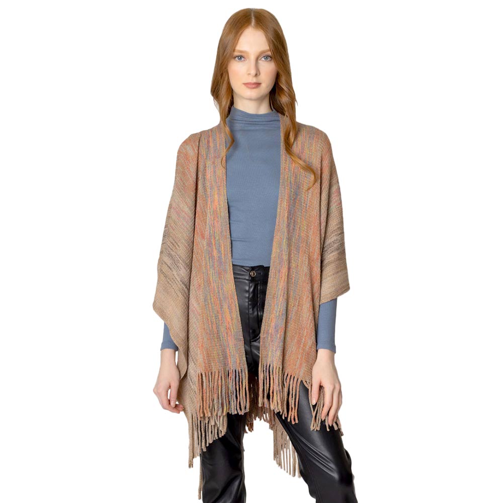 Taupe Multi Colored Metallic Knit Ruana, you can draw attention to the contrast of different outfits. Awesome multi-colored knit Ruana with a Fringe design that gives it a unique decorative and modern look. Match well with jeans and T-shirts or a vest. A fashionable, eye catcher, and useful wear that will quickly become one of your favorite accessories. It keeps you perfectly warm and goes well with all your winter outfits. Enjoy the winter in style!