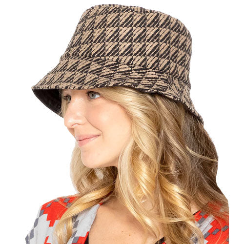 Taupe Polyester Geometric Patterned Bucket Hat, this bucket hat doubles as a rain hat and is snug on the head and stays on well. It will work well to keep the rain off the head and out of the eyes and also the back of the neck. Wear it to lend a modern liveliness above a raincoat on trans-seasonal days in the city.