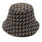 Taupe Polyester Geometric Patterned Bucket Hat, this bucket hat doubles as a rain hat and is snug on the head and stays on well. It will work well to keep the rain off the head and out of the eyes and also the back of the neck. Wear it to lend a modern liveliness above a raincoat on trans-seasonal days in the city.