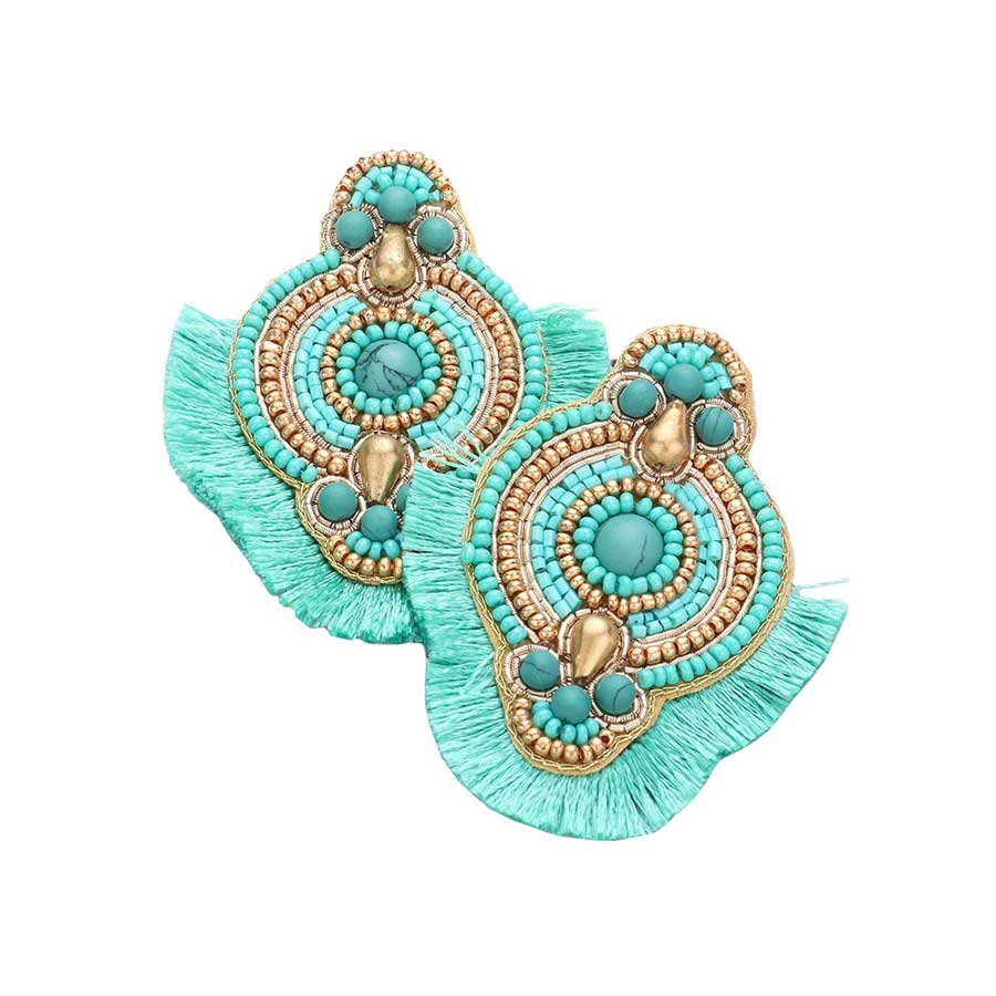 Teal Felt Back Boho Tassel Trimmed Multi Beaded Earrings, are beautifully designed on a tassel theme to put on a pop of color and complete your ensemble. Perfect for adding the perfect beauty & glamor everywhere with these felt-back boho tassel earrings. These multi-beaded earrings are handcrafted jewelry that fits your lifestyle. 