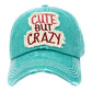 Turquoise Cute But Crazy Message Camouflage Vintage Baseball Cap. This adorable and classic cap combines both colourful styles to turn your head and comfort for your all-day wear. perfect to keep your hair away from you face while exercising, running, playing tennis or just taking a walk outside. Adjustable Velcro strap gives you the perfect fit.
