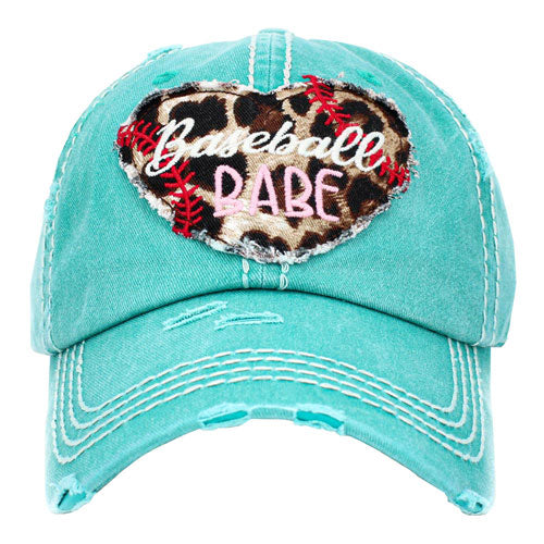 Turquoise Baseball Babe Leopard Patterned Heart Vintage Baseball Cap. Fun cool message themed vintage baseball cap. Perfect for walks in sun, great for a bad hair day. The distressed frayed style with faded colour gives it an awesome vintage look. Soft textured, embroidered message with fun statement will become your favourite cap.