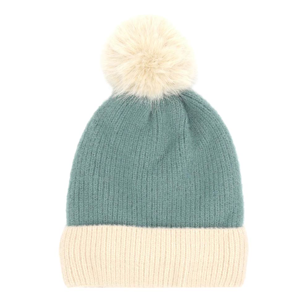 Turquoise Two Tone Knit Pompom Beanie Hat, wear this beautiful pompom Beanie Hat before running out the door into the cool air. It will keep you incredibly warm and toasty on cold days and winter. Accessorize the fun way with this beanie hat to not only get the warmth but also get compliments due to its eye-catchy look. It's the autumnal touch that you need to finish your outfit in style. Beautiful winter gift accessory!