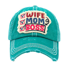 Turquoise Wife Mom Boss Vintage Baseball Cap. Fun cool vintage cap perfect for who is in charge of the home, it is an adorable baseball cap that has a vintage look, giving it that lovely appearance. These stylish vintage caps all feature catchy message themes that are sure to grab some attention. The perfect gift for all occasions! These baseballs are available in a wide variety of designs. Whether you're looking for a holiday present, birthday present, or just something cool to wear, this hat is for you.