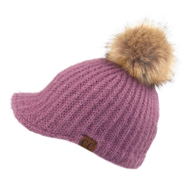 Violet C.C Cable Knitted Brim Beanie Natural Faux Fur Pom Pom Warm Winter Hat; reach for this classic toasty hat to keep you nice and warm in the chilly winter weather, the wintry touch finish to your outfit. Perfect Gift Birthday, Christmas, Holiday, Anniversary, Stocking Stuffer, Secret Santa, Valentines Day, Loved One, BFF