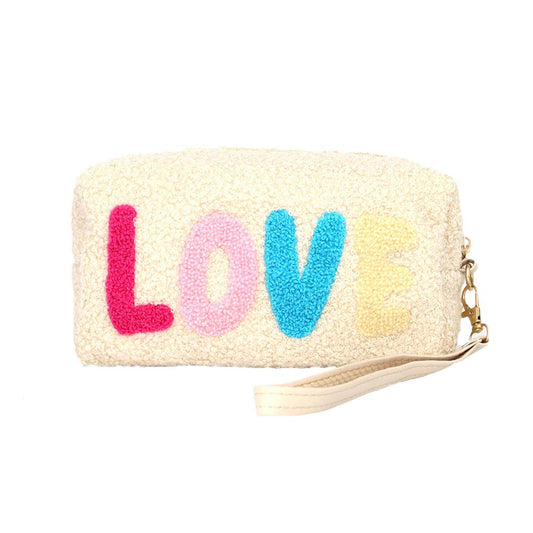 White Faux Fur Love Message Pouch With Wristlet, this excellent and LOVE message-containing wristlet goes with any outfit and shows your trendy choice to make you stand out. perfect for carrying makeup, money, credit cards, keys or coins, etc. Comes with a wristlet for easy carrying. It's perfectly lightweight and simple. Put it in your bag and find it quickly with its eye-catchy colors. Great for running small errands while keeping your hands fr