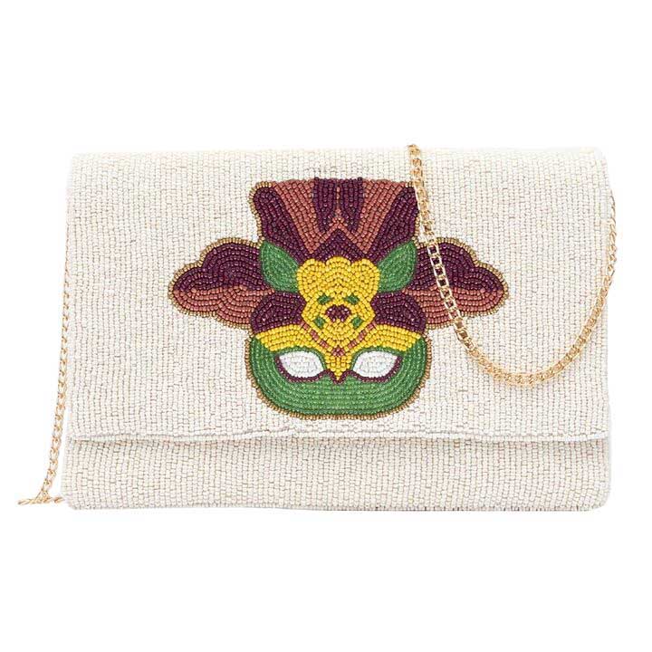 White Mardi Gras Seed Beaded Mask Clutch Crossbody Bag, is designed beautifully and fit for all occasions & places, especially for Mardi Gras. Perfect for makeup, money, credit cards, keys or coins, and many more things. Additionally, this clutch has an optional detachable chain that allows it to be used as a crossbody or shoulder bag, simplifying your life and adding style.