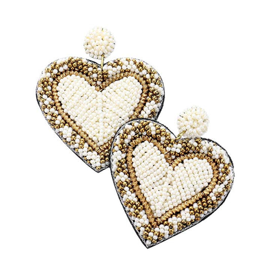 White Seed Bead Heart Earrings,  Wear these gorgeous earrings to make you stand out from the crowd & show your trendy choice. The beautifully crafted design adds a gorgeous glow to any outfit. Put on a pop of color to complete your ensemble in perfect style. These Heart-themed earrings are perfect for adding just the right amount of shimmer & shine. Perfect for Birthday Gifts, Anniversary gifts, Mother's Day Gifts, Graduation gifts, and Valentine's Day gifts. Stay unique & beautiful!