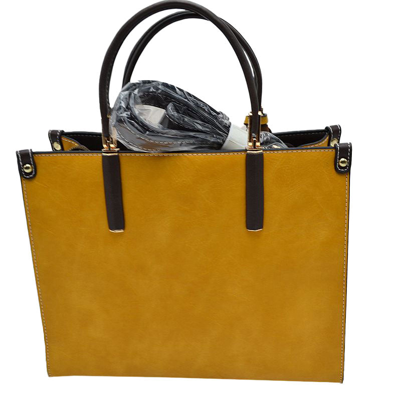 Yellow Large Shoulder Vegan Leather Tassel Handbag For Women. High quality Vegan Leather is a luxurious and durable, Stay organized in style with this square-shaped shopper tote bag that is fully two contrasting interior and exterior solid colors. This vegan leather handbag includes an on-trend removable tassel embellishment. Guaranteed, This will be your go-to handbag. 