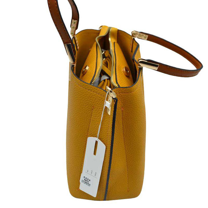 Yellow Simpler Times Bucket Crossbody Bags For Women.A great everyday casual mini shoulder bag composed of premium leather. A simple design with subtle gold hardware details on closure, top handle details and zipper. Equipped with a sleek top handle as well as an adjustable/detachable mesh long strap for multiple carrying options. Magnetic snap closure for an inner zipper pouch opening spacious to hold your phone, wallet, and other essentials secure.